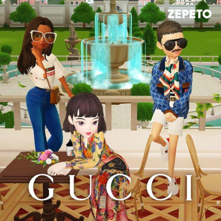 3 Metaverse avatars wearing Gucci clothes. There is the Gucci brand letters at the bottom of the image