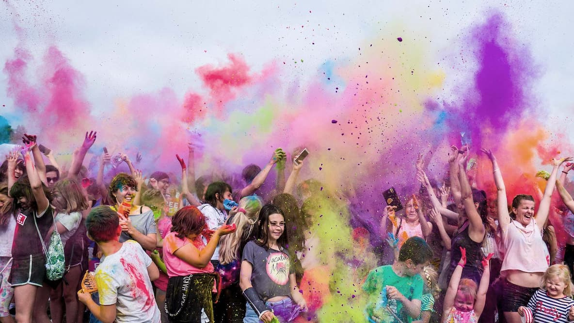 People partying at a color festival