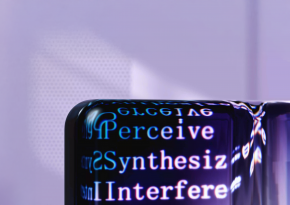 A phone with a screen reflection that shows different words